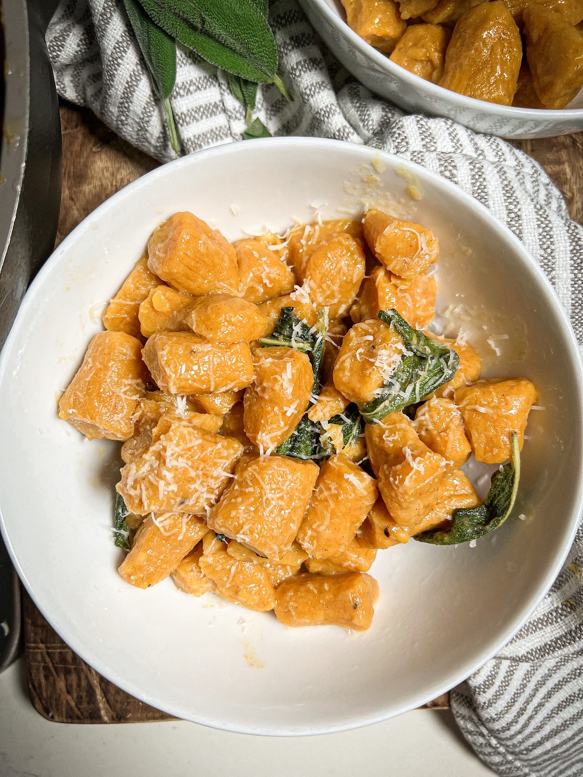 gluten-free sweet potato gnocchi with grated cheese on top