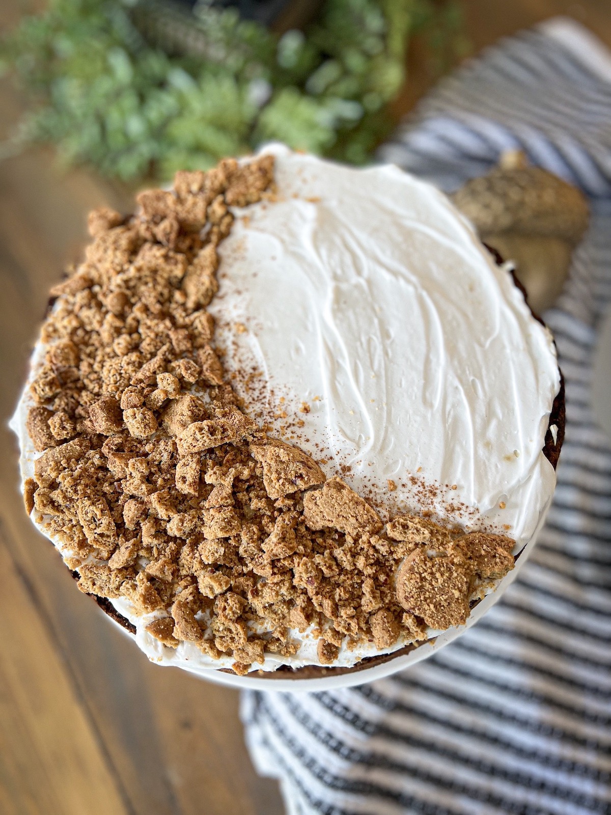 close up of fall equinox spice cake with crumbled cookies in the shape of a moon