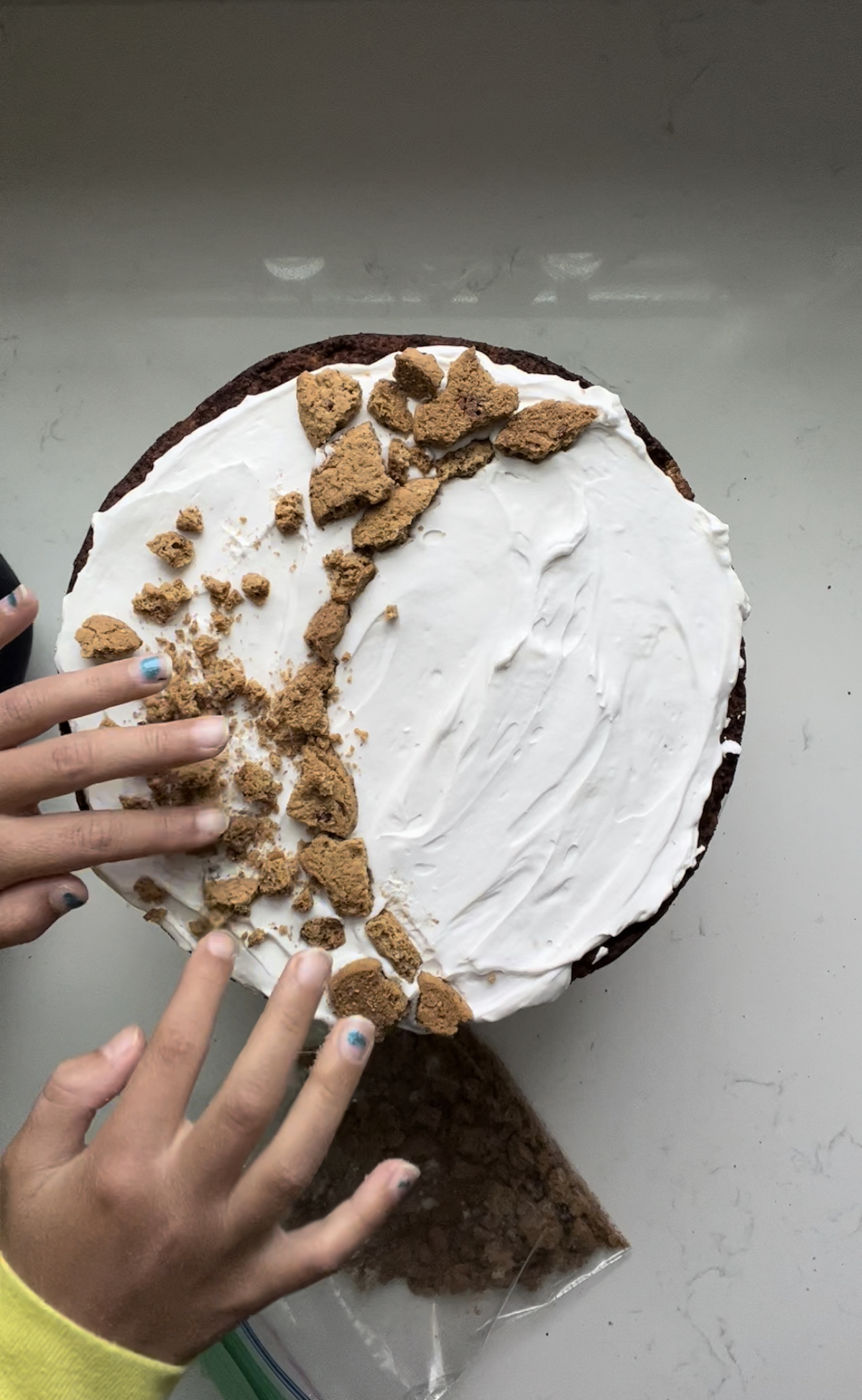 making the shape of the moon with cookie crumbles