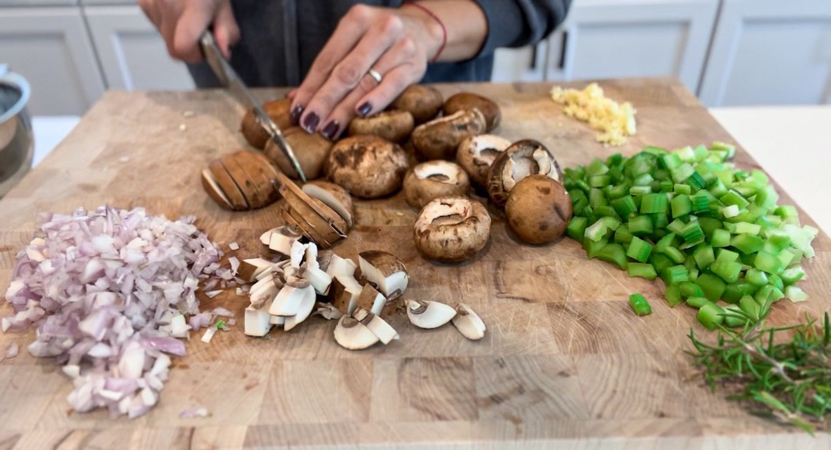 chopping ingredients for mushroom celery soup