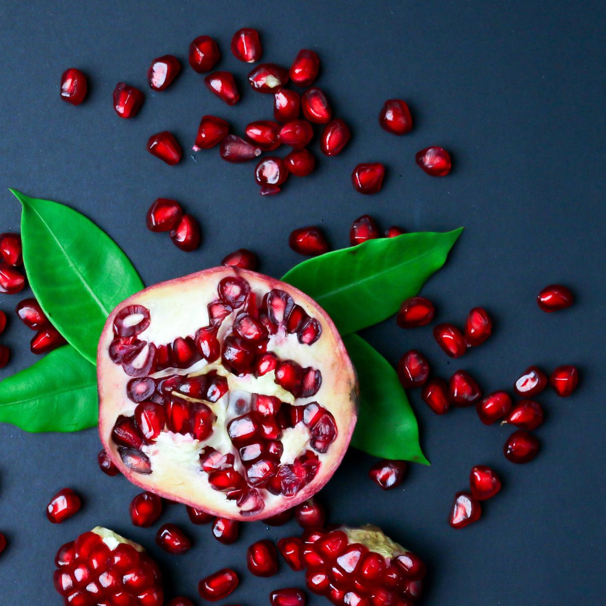 up close photo of pomegranate seeds, or arils